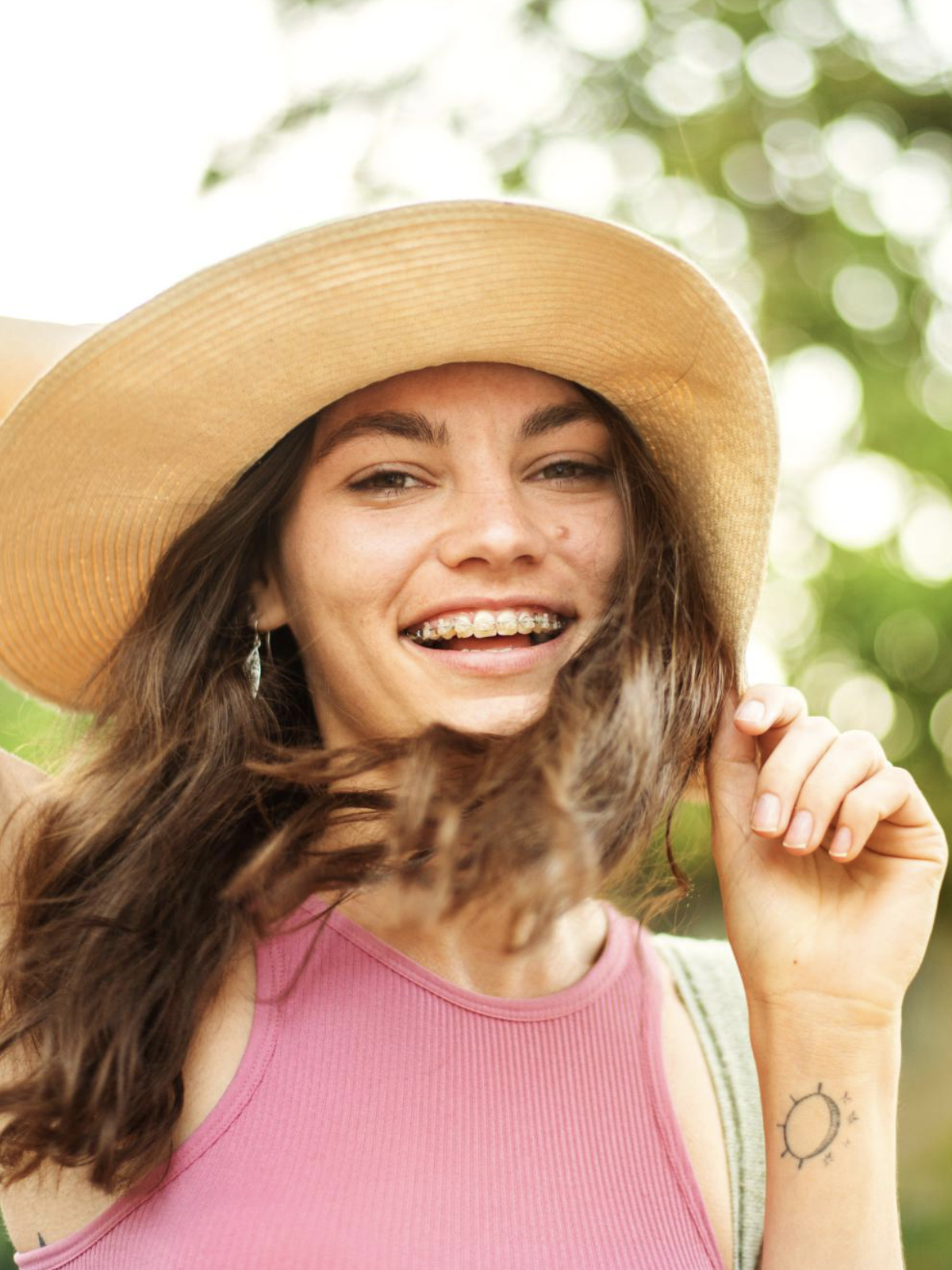 Patient smiling with confidence after orthodontic treatment at Sunflower Orthodontics in Mansfield, TX
