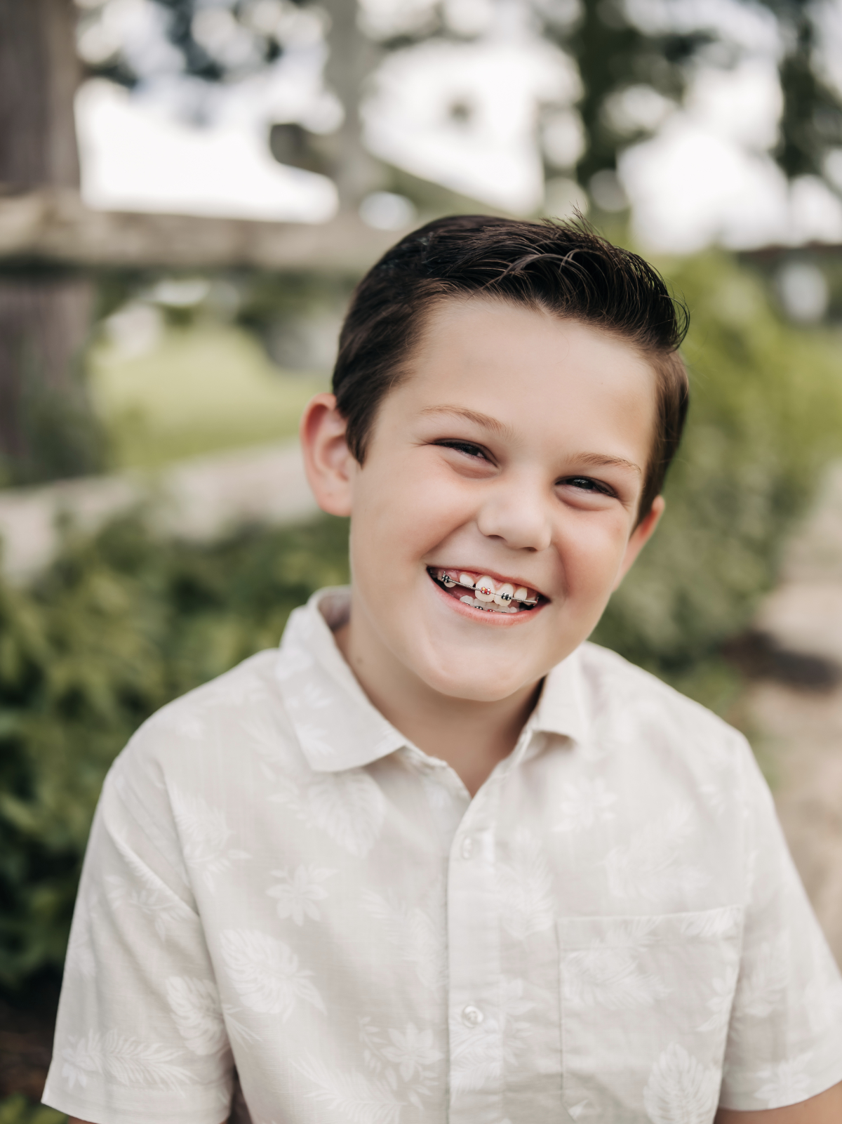 Teen patient smiling with braces at Sunflower Orthodontics, Mansfield orthodontist