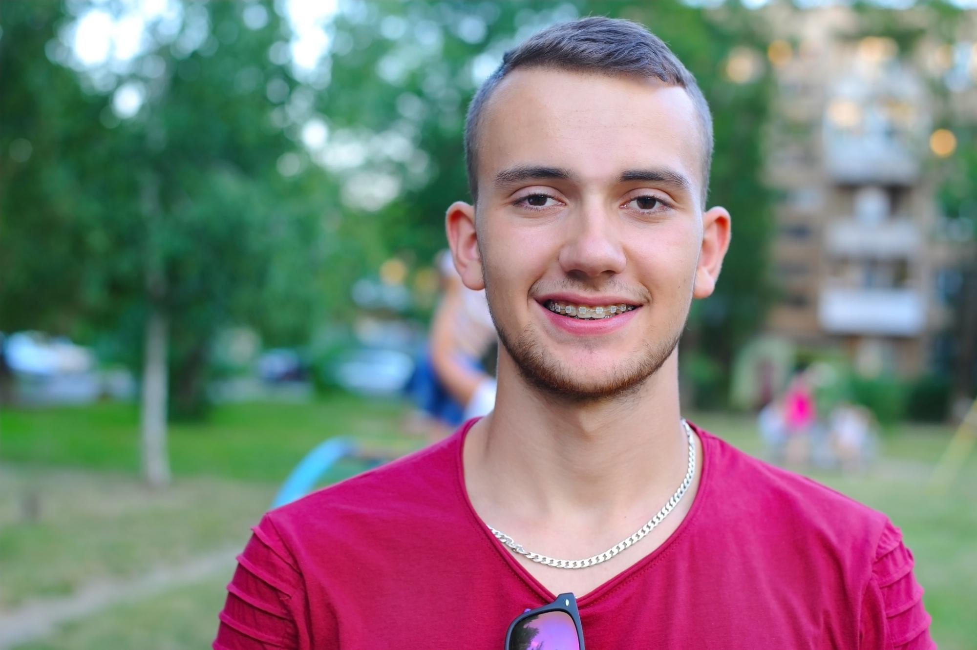 Teen patient smiling with braces at Sunflower Orthodontics, Mansfield orthodontist