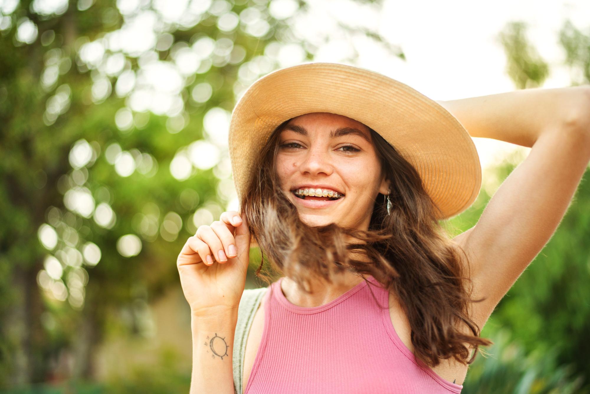 Patient smiling with confidence after orthodontic treatment at Sunflower Orthodontics in Mansfield, TX